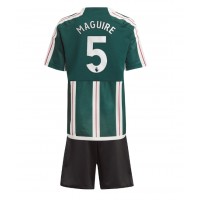 Camisa de Futebol Manchester United Harry Maguire #5 Equipamento Secundário Infantil 2023-24 Manga Curta (+ Calças curtas)